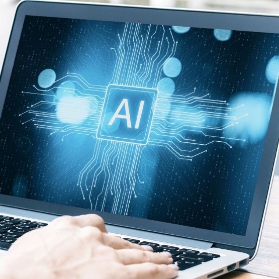 Ordinateur portable affichant un visuel lié à l’intelligence artificielle