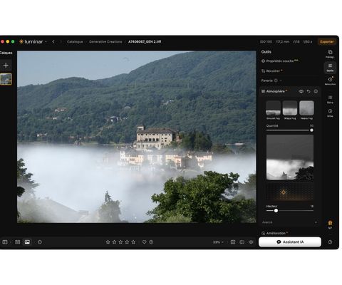 Interface du logiciel Luminar affichant les outils de retouche photo et une photographie de paysage avec un lac entouré de montagnes.